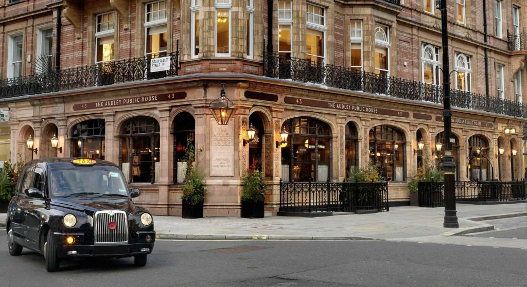 The Audley Public House exterior with black cab